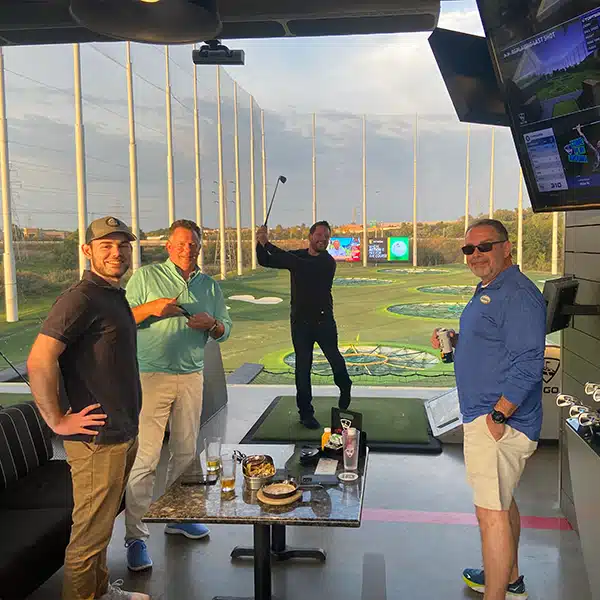 Men at top golf