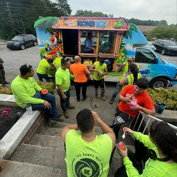 Pallet employees enjoying cold ice cream on steps