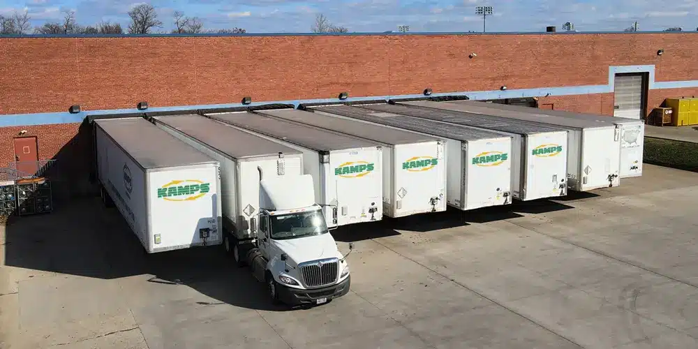 Eight freight trailers parked at the docks in warehouse